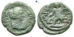 Roman Provincial Pisidia. Ariassos. Julia Domna AD 193-217. Bronze Æ 18 mm., 4,65 g. IOYΛ[...]M[...], draped bust right / APIA[...]EΩN, Kybele seated left on throne, kalathos on head, holding patera, 