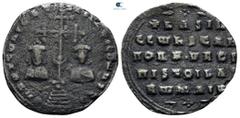 Byzantine Basil II Bulgaroktonos, with Constantine VIII AD 976-1025. Constantinople Miliaresion AR 23 mm, 2,24 g Facing busts of Basil and Constantine flanking ornate cross / +bASIL CCWNSTAN ΠORFVROΓ 