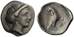 ELIS, Olympia. Circa 350s BC. Obol (Silver, 12mm, 0.93 g 7). Head of the nymph Olympia to right, with her hair in a roll and wearing earring. Rev. FA Eagle, with closed wings and head turned to back t