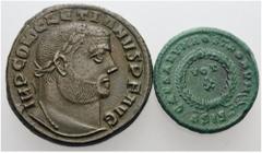 ROMAN. Imperial. A lot containing two late Roman bronze coins. Includes: Diocletian. Follis (26 mm, 8.63 g, 12), Alexandria. RIC VI 32a; Constantine II. Follis (19 mm, 3.92 g, 6), Siscia. RIC VII 182.