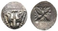 Greek IONIA. Miletos. late 6th-early 5th century BC. Tetartemorion (Silver, 7.5 mm, 0.18 g). Lion's head facing within a triangular border of dots. Rev. Floral or stellar design within a square incuse