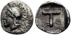 Greek ARKADIA. Tegea. Circa 423-400 BC. Tetartemorion (Silver, 6 mm, 0.23 g, 9 h). Helmeted head of Athena left. Rev. T within incuse square. BCD Peloponnesos 1721. Well struck, clear and toned exampl
