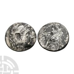 Ancient Greek Coins - Macedonia - Alexander III (the Great) - Countermarked AR Tetradrachm 186-185 B.C. Phaselis, Lycia mint, dated year 33. Obv: head of Herakles right, wearing lionskin headdress, co