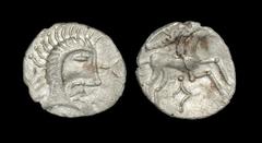 Celtic Iron Age Coins - Iceni - Early Face / Horse 'Boudicca' Unit Circa 50-1 BC. Obv: profile bust right. Rev: horse right with diamond symbol below and branch above. S. 434; V. 790; BMC 3536-3555; A