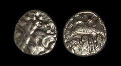 Celtic Iron Age Coins - Iceni - Norfolk Wolf Gold Stater 30-10 BC Obv: wreath motif with cloak and crescents. Rev: wolf left with large pellets above with small pellet over pellet trefoil below. 5.56 