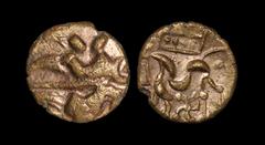 Celtic Iron Age Coins - Corieltauvi - Gold Domino Stater 1st century BC. Obv: wreath and crescents with four-spoked wheel. Rev: lunate horse left with four pellets in box above with four-armed spiral 