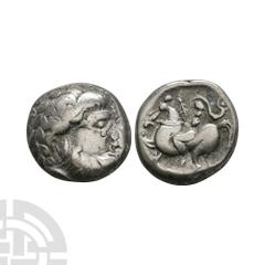 Coins - Celtic Iron Age Danubian Celts - Imitative AR Philip II Stater. 2nd-1st century B.C. Obv: laureate and bearded bust right. Rev: horseman left. Cf. DLT 9782. 13.36 grams. Ex UK private collecti
