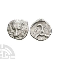 Coins - Greek Dynasts of Lycia - Triskeles AR Fraction. 390-360 B.C. Obv: lion scalp. Rev: triskeles. 2.67 grams. Ex UK private collection. Very fine.