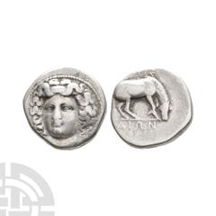 Coins - Greek Thessaly - Larissa - Horse AR Drachm. 400-380 B.C. Obv: facing head of the nymph Larissa, turned slightly to the right, wearing ampyx, drop earrings, and a necklace with a central pendan