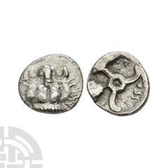 Coins - Greek Dynast of Lycia - Vekhssere II - AR 1/3 stater. 410-380 B.C. Obv: facing lion's scalp. Rev: name of dynast resembling FPVSS^P^ around triskele, with monogram in central circle, all in do