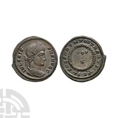 Coins - Roman Imperial Crispus - Wreath Bronze. 320-321 A.D. Siscia mint. Obv: IVL CRISPVS NOB C legend with laureate bust right. Rev: CAESARVM NOSTRORVM legend with VOT / X in two lines within wreath