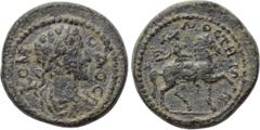 LYDIA. Mostene. Commodus (177-192). Ae. Obv: KOMOΔOC. Laureate, draped and cuirassed bust right. Rev: MOCTHNΩN. Apollo-Mên riding horse right, holding bipennis. RPC IV online -; Isegrim -; apparently 