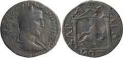 Roman Provincial Maximinus I Thrax. AE 31; Maximinus I Thrax; 235-238 AD, AE 31, 11.18g. SNG Aulock-5608. Obv: Laureate, draped, cuirassed bust r., seen from behind. Rx: Tyche seated l. on rocks withi