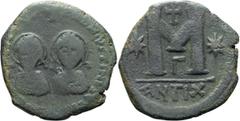 Byzantine Justin I and Justinian I. Follis; Justin I and Justinian I; Antioch, 4 April-1 August 527 AD, Follis, 14.46g. MIB-10 (only 2 spec. from officina Γ=3); officina var. of Berk-118 and Sear-130.