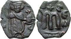 Byzantine Constans II. Follis; Constans II; 641-688 AD. Constantinople, 642/3 AD, Follis, 3.72g. Berk-649, MIB-163. Obv: [E]N TovT - O - N[IKA] Constans standing facing, beardless, wearing crown, hold