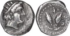 Ancient Greek Caria, Rhodes. Alexandria Diobol; Caria, Rhodes; c. 275-250 BC, Diobol, 0.89g. SNG Keckman-517ff. Obv: Radiate head of Helios r. Rx: P-O flanking two rose buds, helmet above.. gVF
