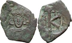 Byzantine Tiberius III. Scarce Half-follis; Tiberius III; 698-705 AD. Constantinople, Year II = 699/700 AD, Half Follis, 2.80g. MIB-75, Sear-1368, Berk-797. Obv: Legend illegible, Bust facing, with sh