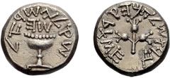 Greek Judaea, First Revolt. 1/2 Punic Shekel; Judaea, First Revolt; Year 5 = 70 CE, Shekel, 13.95g. Hendin-1370a. Obv: Chalice with pearled rim, base is raised by projections on ends; Hebrew "Shekel o