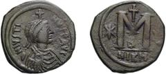 Byzantine Justin I. Follis; Justin I; 518-527 AD. Nicomedia, Follis, 16.82g. Berk-65, MIB-35, Sear-83. Obv: D N IVSTI - NVS PP AVG Diademed bust r., cross above. Rx: Large M between two stars, cross a