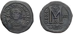 Byzantine Justinian I. Follis; Justinian I; 527-565 AD, Antioch, Year 13 = 539/40 AD, Follis, 21.59g. Berk-236, DO-215a, Sear-218. Obv: DN IVSTINI-ANVS PP AVG Helmeted and cuirassed bust facing, holdi