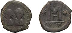 Byzantine Justin I and Justinian I. Follis; Justin I and Justinian I; Antioch, 4 April-1 August 527 AD, Follis, 14.46g. MIB-10 (only 2 spec. from officina G=3); officina var. of Berk-118 and Sear-130.