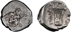 Greek Silver Ionia, Teos. Alexandria Diobol; Ionia, Teos; c. 320-294 BC, Diobol, 0.94g. SNG Kayhan-612. Obv: Griffin seated r., raising l. forepaw. Rx: Lyre; TH[I] above, A????O? downwards on l.. EF B