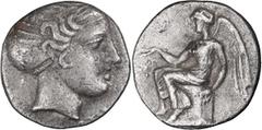 Greek Bruttium, Terina. Triobol; Bruttium, Terina; Triobol, 1.04g. HN Italy-2624. Obv: Head of Nymph r., hair bound in sphendone. Rx: Nike seated l.Extremely beautiful. Slightly granular planchet. VF