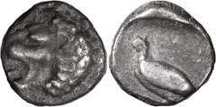 Greek Caria, Mylasa. Archaic Tetartemorion; Caria, Mylasa; Fifth cent. BC, Tetartemorion, 0.18g. Obv: Forepart of lion l. Rx: Bird standing l. within incuse square.. VF