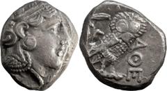 Ancient Greek Coins Attica, Athens. Tetradrachm; Attica, Athens; 4th cent. BC, Tetradrachm, 17.41g. Obv: Head of Athena r. Rx: Owl standing r., head facing.The planchet of this coin is oval, not unusu