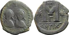 Byzantine Justin I and Justinian I. Follis; Justin I and Justinian I; Antioch, 4 April-1 August 527 AD, Follis, 14.46g. MIB-10 (only 2 spec. from officina G=3); officina var. of Berk-118 and Sear-130.