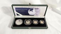 UNITED KINGDOM. Lot of 4 silver coins. Coin 1: Elizabeth II, 1952-2022, 2 Pounds 2005. Royal Mint. Proof. Britannia. Mintage: 3,899. 40 mm. 32.45 g. 958/1000 Silver. The fifth Britannia design by Phil