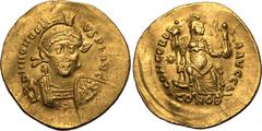 ROMAN EMPIRE. Honorius. Solidus solidus, AD 408-420. Constantinople. Obv: D N HONORIVS P F AVG, helmeted, pearl-diademed and cuirassed bust slightly right, holding spear and shield adorned with horsem