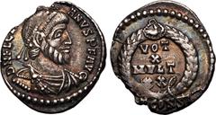 F. Roman Empire About Good Very Fine; striking tone and rainbow iridescence | ROMAN EMPIRE. Julian II. Silver siliqua, AD 360-363. Arelate. Obv: D N FL CL IVLIANVS P F AVG, pearl-diademed, draped and 