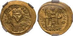 MS Strike: 5/5 Surface: 3/5, slight bend | BYZANTINE EMPIRE. Phocas. Gold solidus, AD 607-610. Constantinople. Obv: ∂ N FOCAS PÐ„RP AVC, draped and cuirassed bust facing, holding globus cruciger and w