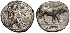 MAGNA GRAECIA. LUCANIA, POSEIDONIA. Silver Diobol, circa 410-350 BC. Obv: Poseidon advancing right, wielding trident and extending left hand before him; branch in left field, ΠOΣΕ in right field. Rev:
