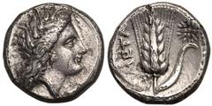 MAGNA GRAECIA. LUCANIA, METAPONTION. Silver Nomos, circa 330-290 BC. Ly-, magistrate. Obv: wreathed head of Demeter right, wearing triple-pendant earring and necklace; EY below chin. Rev: ear of barle