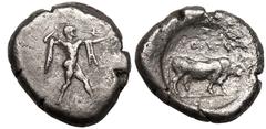 MAGNA GRAECIA. LUCANIA, POSEIDONIA. Silver Nomos, circa 470-445 BC. Obv: Poseidon standing right, wearing chlamys around shoulders, brandishing trident; ΠΟMΕΣ downwards before. Rev: bull standing righ
