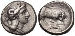 MAGNA GRAECIA. LUCANIA, THOURIOI. Silver Nomos, circa 350-300 BC. Obv: head of Athena right, wearing crested Attic helmet decorated with Skylla holding trident. Rev: ΘΟΥΡΙΩΝ, bull butting right; Δ abo