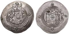 ISLAMIC. ARAB-SASANIAN. al-Muhallab ibn Abi Sufra. Silver Drachm, dated AH 76 = AD 695/6. Bishapur. Obv: crowned Sasanian-style bust right. Rev: fire altar with ribbons and attendants. Extremely Fine.