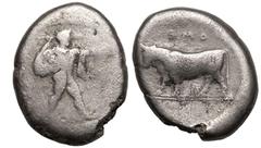 MAGNA GRAECIA. LUCANIA, POSEIDONIA. Silver Nomos, circa 470-445 BC. Obv: Poseidon standing right, wearing chlamys around shoulders, brandishing trident; ΠΟΜΕ downwards before. Rev: bull standing left,