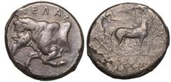 MAGNA GRAECIA. SICILY, GELA. Silver Tetradrachm, circa 450-440 BC. Obv: charioteer, holding kentron and reins, driving walking quadriga right; above, Nike flying right, crowning horses with wreath. Re