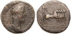 ROMAN EMPIRE. Commodus. Bronze Sestertius, AD 186. Rome. Obv: M COMMODVS ANT P FELIX AVG BRIT, laureate head right. Rev: P M TR P XI IMP VII, emperor standing in triumphal quadriga moving to right, ho