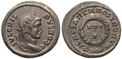 ROMAN EMPIRE. Crispus (Caesar). Bronze Nummus, AD 323-324. Lugdunum. Obv: IVL CRISPVS NOB C, laureate head right. Rev: CAESARVM NOSTRORVM, VOT X in two lines within laurel wreath; PLG and crescent in 