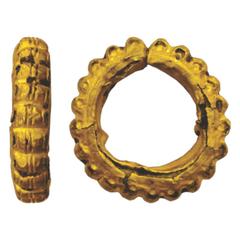 Ancient India. Ancient Indian ear ornament, c. 2nd-3rd century AD – lead core clad in gold, serrated and striated scalloped shape, 14.15g.