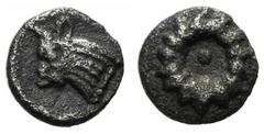 A selection of fractions and Arabian coins Ionia, Erythrai(?), c. 480-450 BC, Tetartemorion, 0.09g, 4mm. Rosette with central pellet / Bull's head left. Very Fine, Extremely rare. Unpublished in the s
