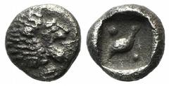 A selection of fractions and Arabian coins Ionia, Miletos, late 6th-early 5th century BC, Tetartemorion, 0.25g, 5mm. Head of roaring lion right / Eagle standing right; pellet above and below; all with