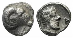 A selection of fractions and Arabian coins Caria, Kasolaba(?), c. 420-400 BC, Hemiobol, 0.37g, 6mm. Ram's head right / Youthful male head right within incuse. Konuk, Kasolaba 5. Very fine.