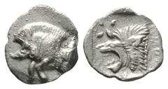 Greek Mysia, Kyzikos, c. 450-400 BC, Hemiobol, 0.37g, 8mm. Forepart of boar left; tunny to right / Head of lion left; star to left; all within incuse square. Von Fritze II, 10; SNG BnF 376. Very fine,