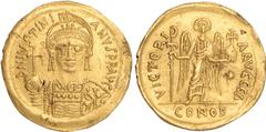 Ancient Coins, Justinian I (AD 527-565), gold solidus, Constantinople mint, DN IVSTINIANVS PP AVI, helmeted and cuir. bust facing, holding a gl. cr. and shield, rev. VICTORIA AVGGG, followed by offici