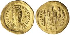 ANCIENT GOLD COINS - BYZANTINE Justin I, (518-527), gold solidus, issue of 519-527, 7th officina, Constantinople mint, (4.41 g), obv. helmeted and cuirassed bust slightly three-quarters right, holding